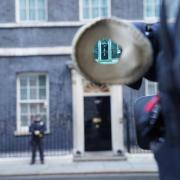 The door of the Prime Minister's official residence in Downing Street, Westminster, London,  seen through the viewfinder of a television camera (PA)