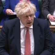 Prime Minister Boris Johnson updates MPs in the House of Commons with the plan for living with Covid-19 (PA)