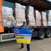 Organiser of the Help from Bournemouth to Ukraine group, Karol Swiacki, with donations made for Ukraine.