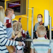 Despite lifting of restrictions, easyJet is continuing to requests masks are worn throughout their flights. Picture: PA