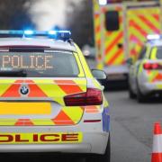 Road blocked after crash involving two cars