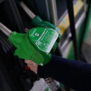 Government figures show the average price of a litre of petrol at UK forecourts on Monday hit record highs (PA)