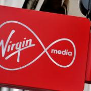 Virgin Media customers warned over controversial £25 fine over 'answering the door'. (PA)