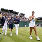 Jodie Burrage (right) had no hesitation in handing out Percy Pig sweets to the ball boy who had fallen ill during her first-round defeat to Lesia Tsurenko (Pic: PA)