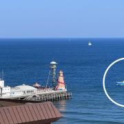 Dorset Belle (circled) returning to Bournemouth Pier amid beach incident.