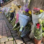 Tributes left in Bournemouth square for Cameron