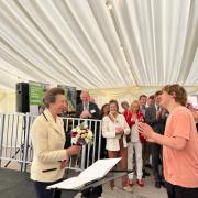 Princess Anne received flowers from a student at Millie College