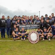 Wimborne Town celebrate winning the Southern League Division One South