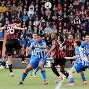 Enes Unal heads home Cherries' second goal against Brighton at Dean Court last season.