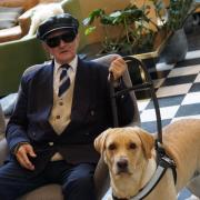 Brian Robinson, 78, with his guide dog Zena