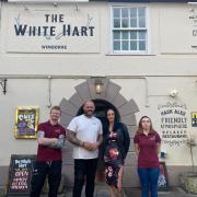 CJ and his partner, Anne Marie (centre) with new staff at The White Hart