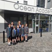 Colleen Duggan (Principal) and Jo Quarrie (Executive Principal) with pupil MPs from the school's parliament.