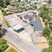 The vacant Wells vehicle garage site, just off the A338