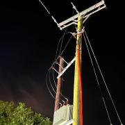 Electricity pylon catches fire at campsite