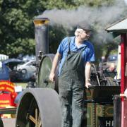 Pix by Andy Horsfield - 14/08/04 - purCou04 15th Annual Studland Country fair.......getting all steamed up on a steam road roller..