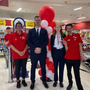 Store manager Ben Hunt (middle left) with deputy manager Amelia Hawkins (middle right) at the grand opening