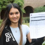 Students at Talbot Heath  School in Bournemouth  receive their GCSE results.