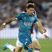 Bournemouth's Evanilson in action against West Ham United's Max Kilman during the Carabao Cup