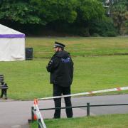 A police officer manning a cordon in Bournemouth's Lower Gardens on Sunday