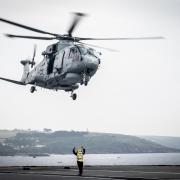 Undated handout photo issued by the Ministry of Defence of a Merlin helicopter conducting training