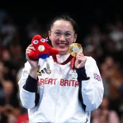 Great Britain's Alice Tai poses with her gold medal during the Women's 50m Freestyle S8 medal ceremony at the Paris La Defense Arena on day eight of the Paris 2024 Summer Paralympic Games. Picture date: Thursday September 5, 2024.