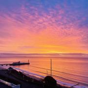 Bournemouth Pier at sunrise by Susan Harvey of the Dorset Camera Club