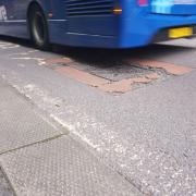 Noisy manhole cover in Poole Road, Westbourne