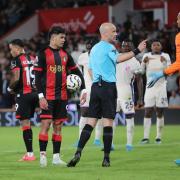 AFC Bournemouth v Chelsea  at Vitality Stadium.. Referee Anthony Taylor talks tocheklsea goalie Robert Sanchez while Evanilson waits to take the penalty.