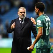 Ange Postecoglou (left) shakes hands with matchwinner Brennan Johnson (Mike Egerton/PA)