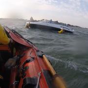 Poole RNLI were called to a speedboat beached on Hook Sands.