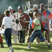 pix by Andy Horsfield - 21/08/04 - cReg15Christchurch regatta on the Quay - Fafnir's bane (Viking, Saxon, Norman and Celtic re-enactment society)...some of the audience repel the invaders..