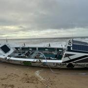 Atlantic Challenge rowing boat stranded on Bournemouth beach