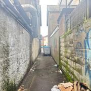 An alleyway was also cordoned off as a result of the investigation.