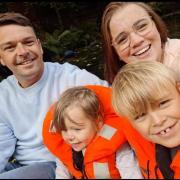 Sam with partner Billie and children Marley and Mabel.