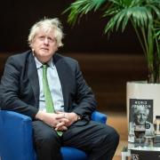 Protesters have covered Boris Johnson's new book with others at a Waterstones store