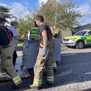 Emergency services at the scene of an incident in Swanage that left three people dead