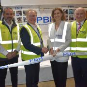 Jessica Toale, Bournemouth West MP, officially opens the new PBH Manufacturing site with (left to right) Chris Elms, General Manager; Martyn Bright, Managing Director, and Mike McKenna, Chief Executive.