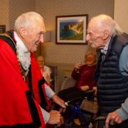 Mayor Councillor Terry Cordery greeted by 98-year-old war veteran resident Adrian Nadler