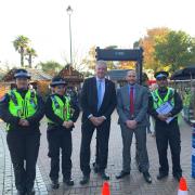 David Sickwick and Andy Bell pictured with knife arch and officers