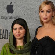 Malala Yousafzai and Jennifer Lawrence at the LA premiere of Bread & Roses (Chris Pizzello/AP)