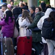 Passengers at Gatwick airport, where flights have been cancelled and delayed after a ‘suspected prohibited item’ was found in luggage (Gareth Fuller/PA)