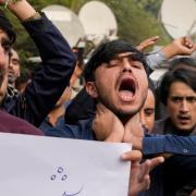 People protesting after 42 Shiite Muslims were killed by gunmen in an ambush in Kurram (AP Photo/K.M. Chaudary)