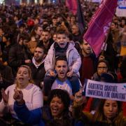 Demonstrators march in Barcelona (Emilio Morenatti/AP)