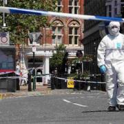 INVESTIGATION: Police tape sealing off part of Roumelia Lane in Boscombe through to Sea Road after last week’s murder