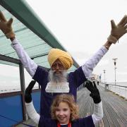 PUTTING IN LEGWORK: Marathon runner Jauja Singh, 101, and Katie Few, 8, from Verwood at the launch of the Marathon Festival