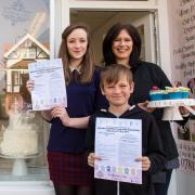 Helen Shaw of Vanilla Pink Cakes and Abigail and Samuel Clark who are promoting the children's competition. (22977619)