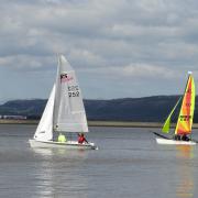 WE ARE SAILING: Sailors enjoying calm waters