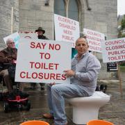 A protest against Borough of Poole closing public toilets