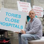 A protest against Borough of Poole closing public toilets.