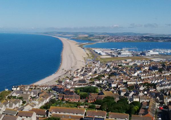 Portland looking north over Lyme Bay, Chesil Beach & Portland Harbour by Rachel Rogers
